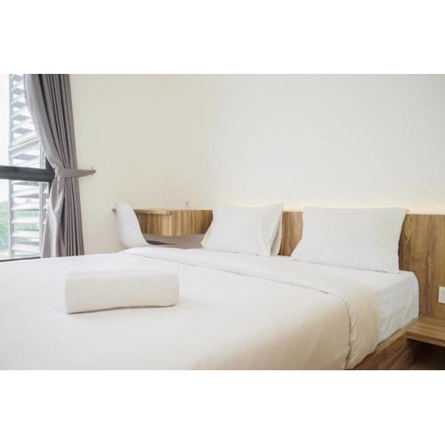 Fully Furnished and Tidy 2BR at Sky House BSD Apartment By Travelio