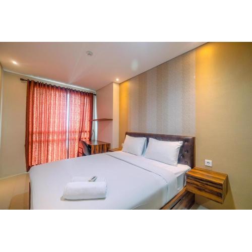 Fully Furnished Apartment with Comfortable Design 1BR Woodland Park Residence By Travelio