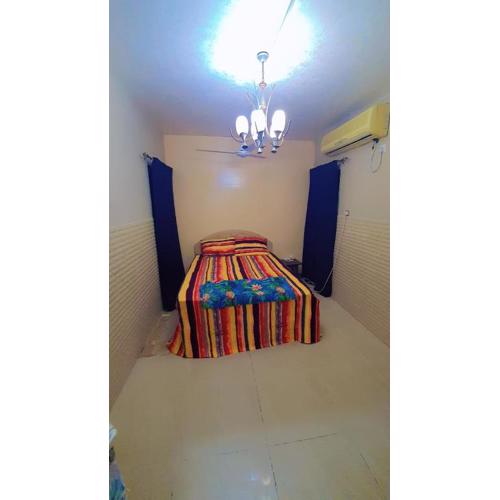 Fully Furnished bedroom with shared bathroom in a villa sharjah