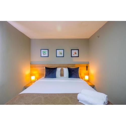 Fully Furnished with Comfortable 1BR Apartment at Mustika Golf Residence By Travelio