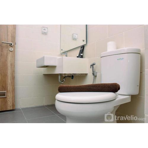 Fully Furnished with Comfortable Design 1BR Apartment at Pejaten Park Residence By Travelio