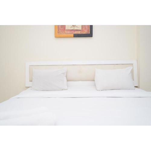 Fully Furnished with Comfortable Design 1BR Apartment Silkwood Residences By Travelio