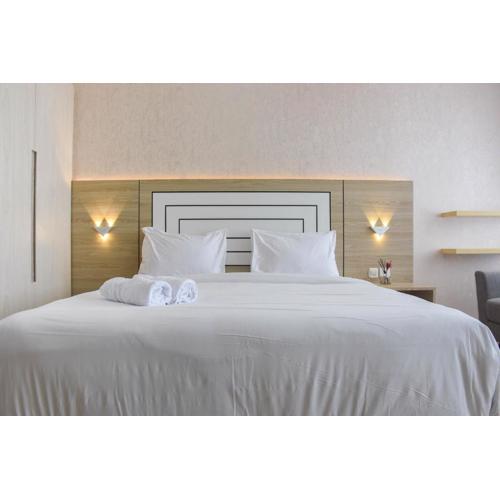 Fully Furnished with Cozy Design Studio at Menteng Park Apartment By Travelio