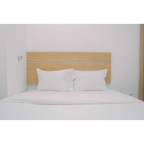 Furnished and Relaxing 2BR Bassura City Apartment near Mall By Travelio