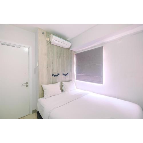 Furnished Green Pramuka 1BR Apartment with Modern Style and City View By Travelio