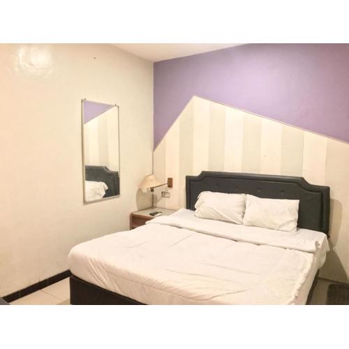 Gangnam Style Residence Mitra RedDoorz near MERR Surabaya