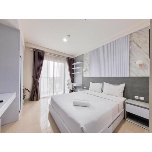 Good and Cozy Studio at Patraland Amarta Apartment By Travelio