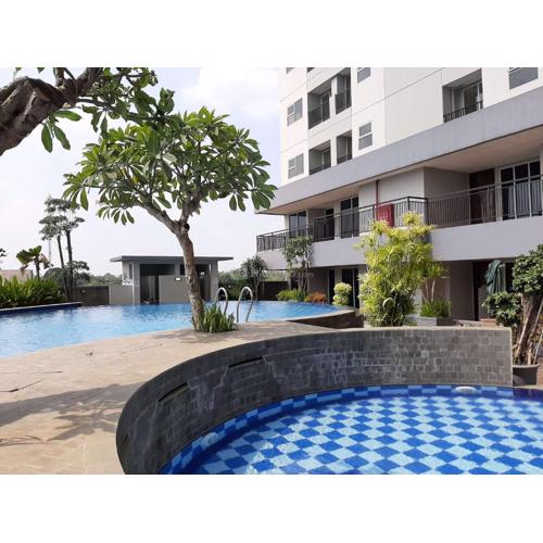 Good and Homey 2BR at Parkland Avenue Apartment By Travelio