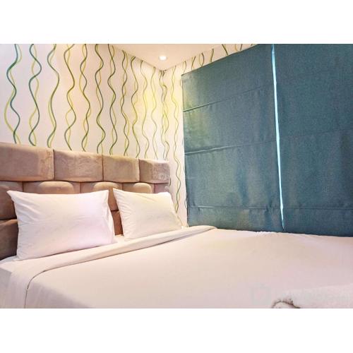 Good Deal and Comfy 1BR Vida View Apartment By Travelio