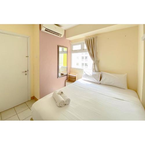 Good Deal and Well Design 2BR Green Pramuka City Apartment By Travelio