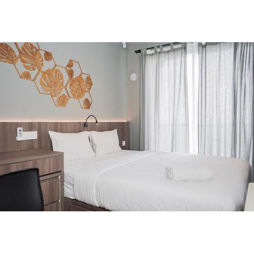 Good Designed and Cozy Studio at Sky House BSD Apartment By Travelio