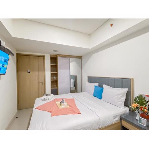 Good Place and Homey Studio Meikarta Apartment By Travelio
