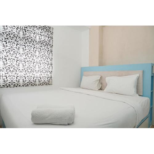 Gorgeous 2BR Green Pramuka Apartment By Travelio