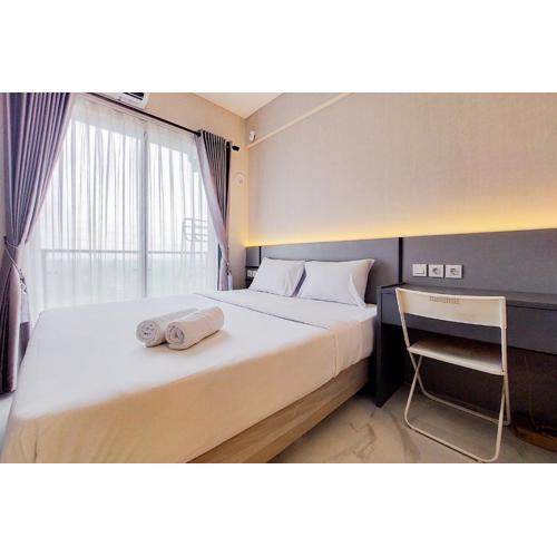 Gorgeous and Tidy Studio at Sky House BSD Apartment By Travelio