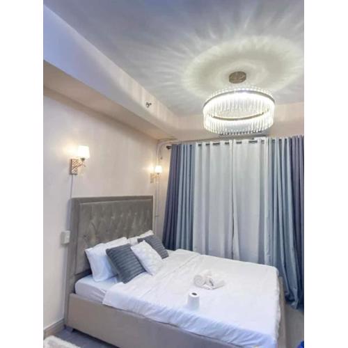 Grace Residences Elevate Escapes - near BGC airport