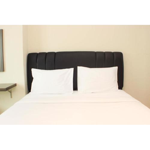 Great Location and Comfy 2BR Apartment at Thamrin Residence By Travelio