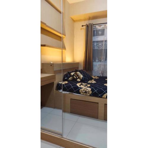 Green pramuka by Santoso Family