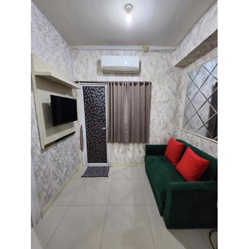 Green pramuka by Santoso Family