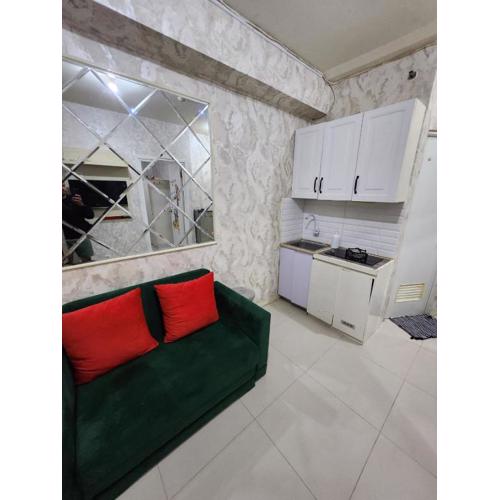 Green Pramuka by Santoso Family