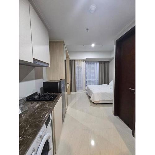 Green Sedayu Apartment Suite by Ellison