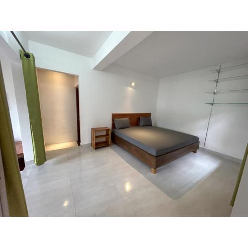 HnM Kandy - Peradeniya Small Apartment with a luxury bed, kitchen, living area, attached washroom