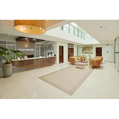 Holiday Suites Business District - formerly Empire Suites Hotel