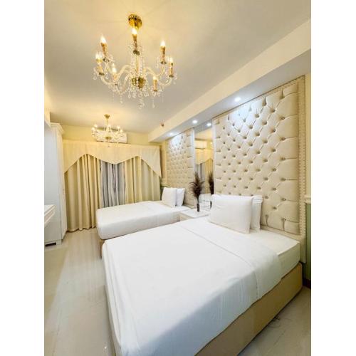 Homefort Twin Bed Suite - Red Residences Makati 2202