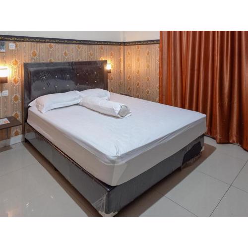 Homestay Singgasana Mitra RedDoorz