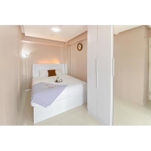 Homey 1BR Apartment @ Bassura City By Travelio