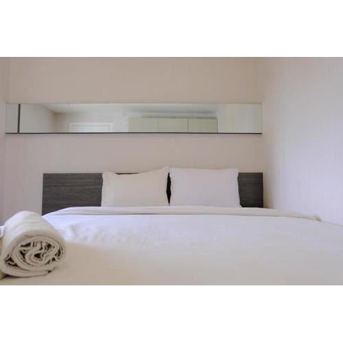 Homey 1BR at Apartment Parahyangan Residence By Travelio