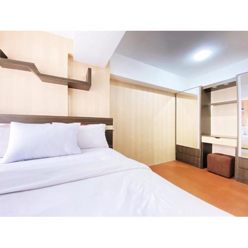 Homey 1BR at Jarrdin Cihampelas Apartment By Travelio