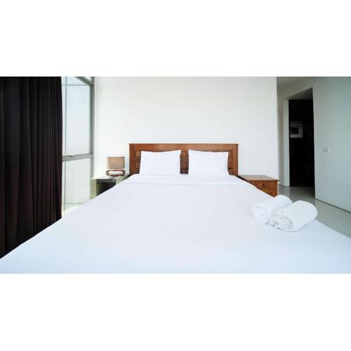 Homey 1BR with Extra Room Apartment at Aryaduta Residence Surabaya By Travelio