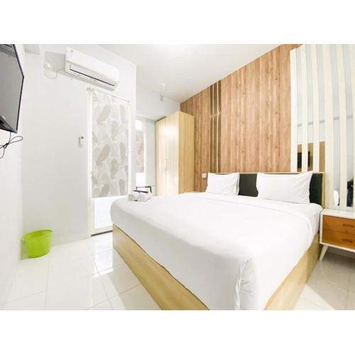 Homey 1BR without Living Room at Amartha View Apartment By Travelio