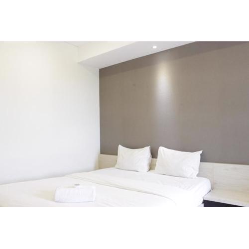 Homey 2BR Apartment at Parahyangan Residence near Parahyangan University By Travelio