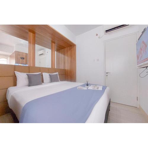 Homey 2BR Apartment at Urban Heights Residence By Travelio