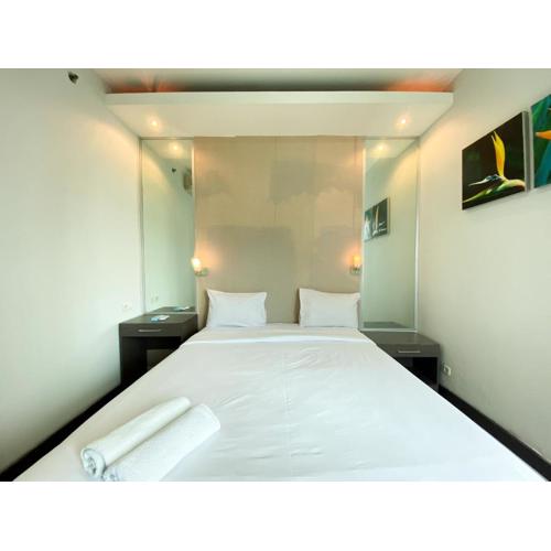 Homey 2BR Apartment Crown Court Executive Condominium By Travelio