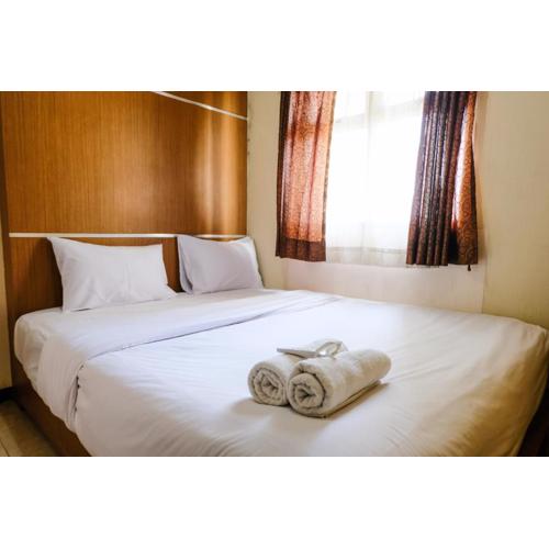 Homey 2BR at Suites @Metro Apartment By Travelio