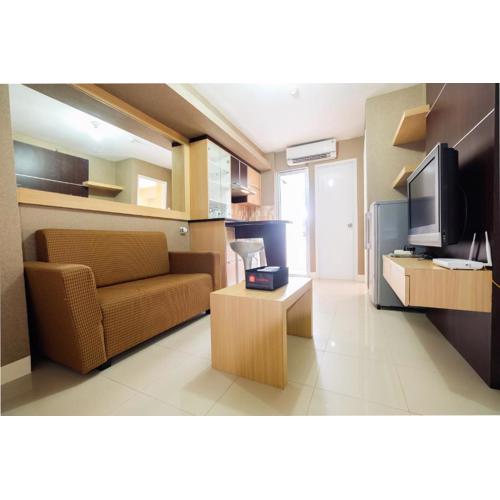 Homey 2BR Bassura City Apartment By Travelio