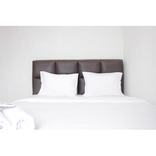 Homey 2BR Majesty Apartment near Maranatha University By Travelio