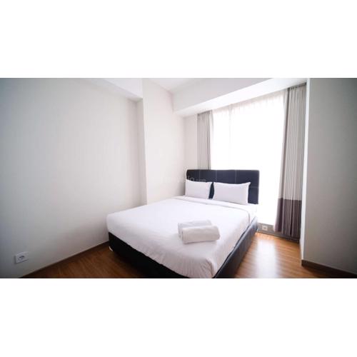 Homey 3BR with Private Lift at Grand Sungkono Lagoon Apartment By Travelio