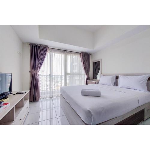 Homey and Best Choice Studio 16th Floor Casa De Parco Apartment By Travelio