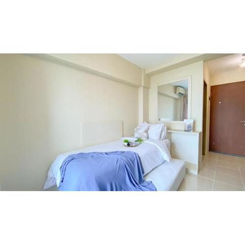 Homey and Best Place Studio Tifolia Apartment By Travelio