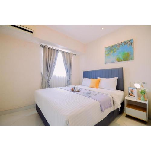 Homey and Big Studio Apartment at The Wave Kuningan By Travelio