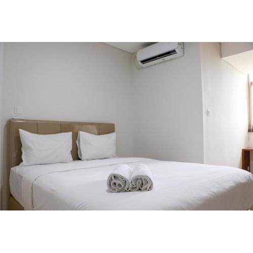 Homey and Comfort Living 2BR at Daan Mogot City Apartment By Travelio