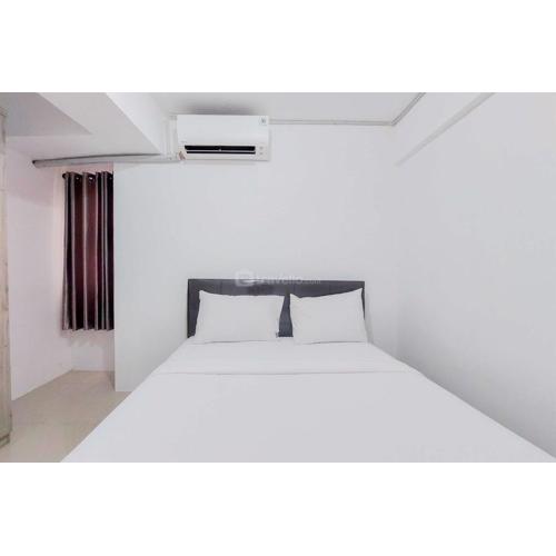 Homey and Comfort Living 2BR Urbantown Serpong Apartment By Travelio