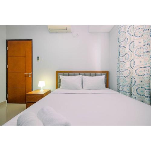 Homey and Comfortable 1BR Apartment at Royal Olive Residence By Travelio