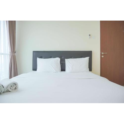 Homey and Comfortable 2BR Tifolia Apartment By Travelio