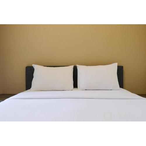 Homey and Comfy 2BR Apartment at Parahyangan Residence By Travelio