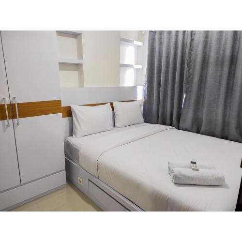 Homey and Comfy 2BR at Vida View Apartment By Travelio