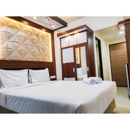 Homey and Comfy Studio at Vida View Makasar Apartment By Travelio